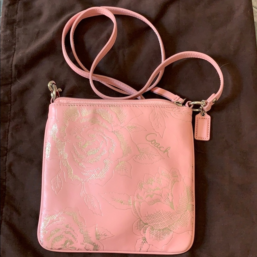 Pink Coach leather crossbody bag with silver roses